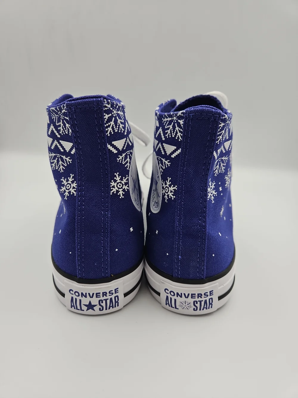 Converse High-Top Sneakers in Royal Blue with White Snowflake Print